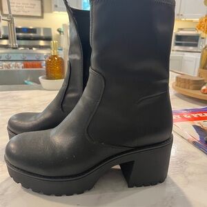 Women’s Black chunky boots.
